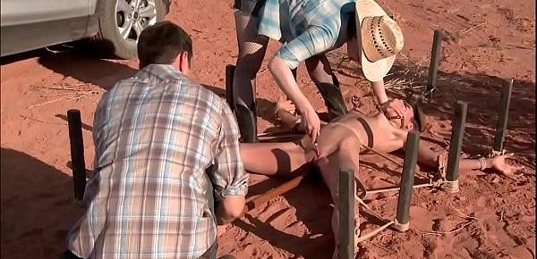  Bound hitchhiker anal toyed in desert